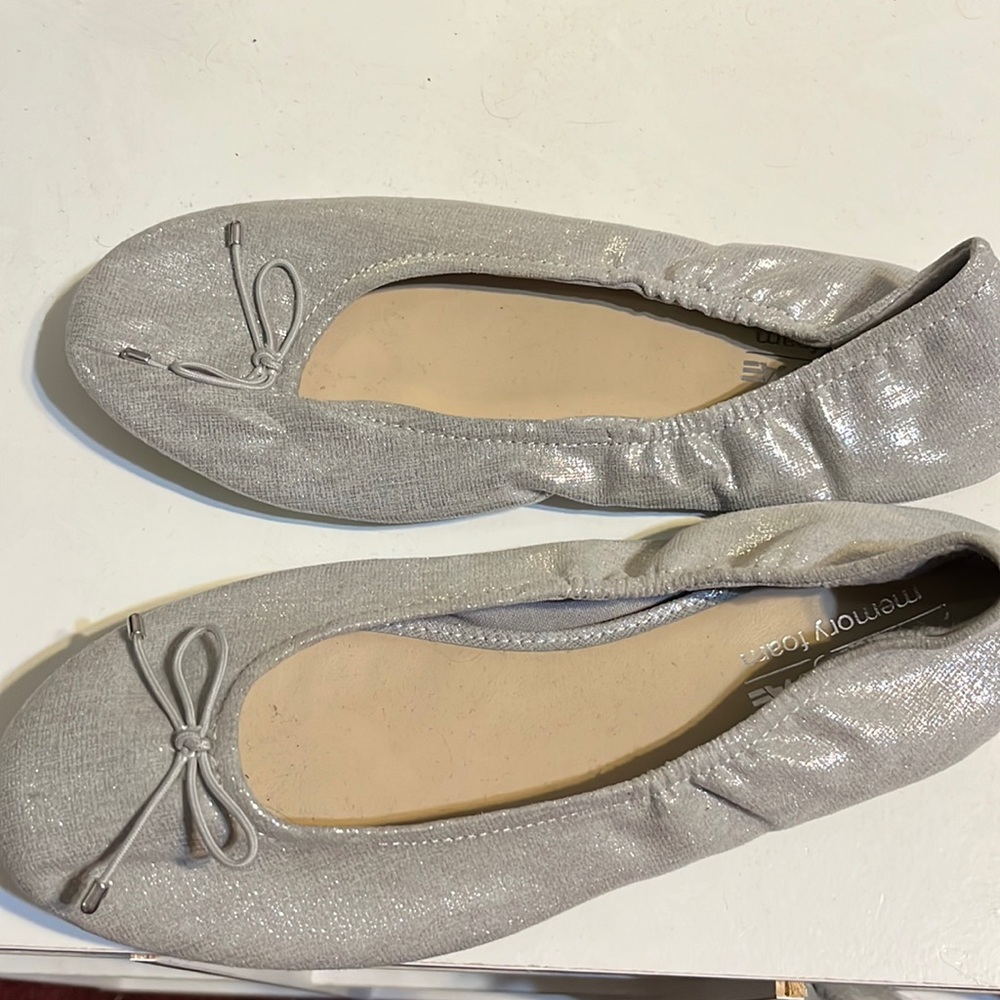 Shiny silver flats